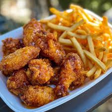 honey glazed chicken wings with fries